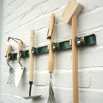 Wall-mounted-tool-rack-in-green.jpg